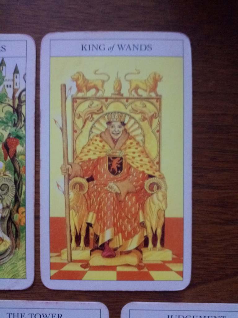 A tarot card, the King of Wands.