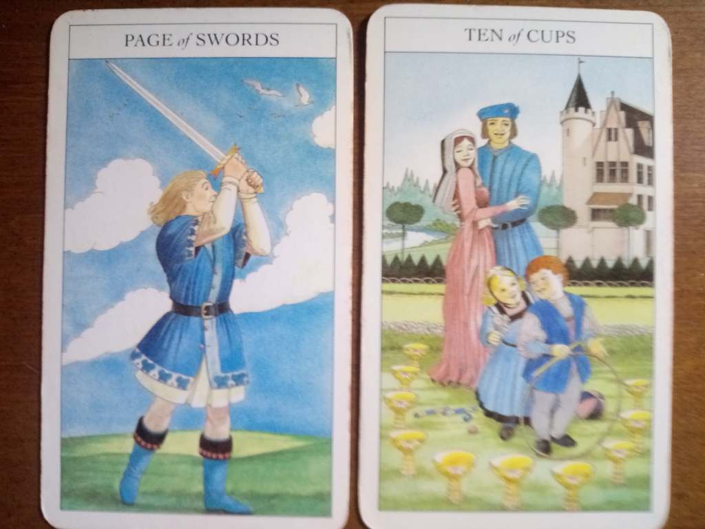 Two tarot cards: Page of Swords, Ten of Cups