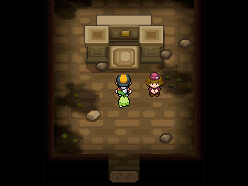 A chamber in the ruins.  Stone floors littered with rubble.  A mysterious altar in the middle of the room.  A tour guide in a burgundy uniform stands to the side.