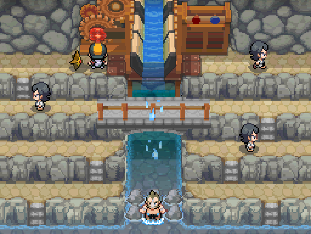 Turning the winch.  The waterfall chute rises up, the water stops flowing, and the waterfall over Chuck's head stops.