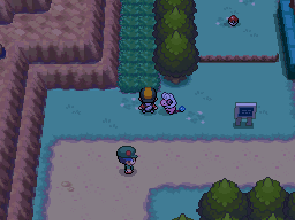 Back outside. A path through the long grass leads around the gatehouse.